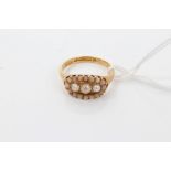 Victorian gold (18ct) three-pearl ring with seed pearl border.