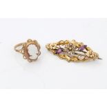 Victorian gold (9ct) floral scroll brooch set with seed pearls and two purple stones,