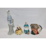 Two Royal Doulton figures - The Favourite HN2249 and Symphony,