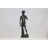 Contemporary bronze figure of a standing nude man,