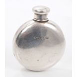 Early George V silver spirit flask of small circular form, with threaded cap (Birmingham 1912),