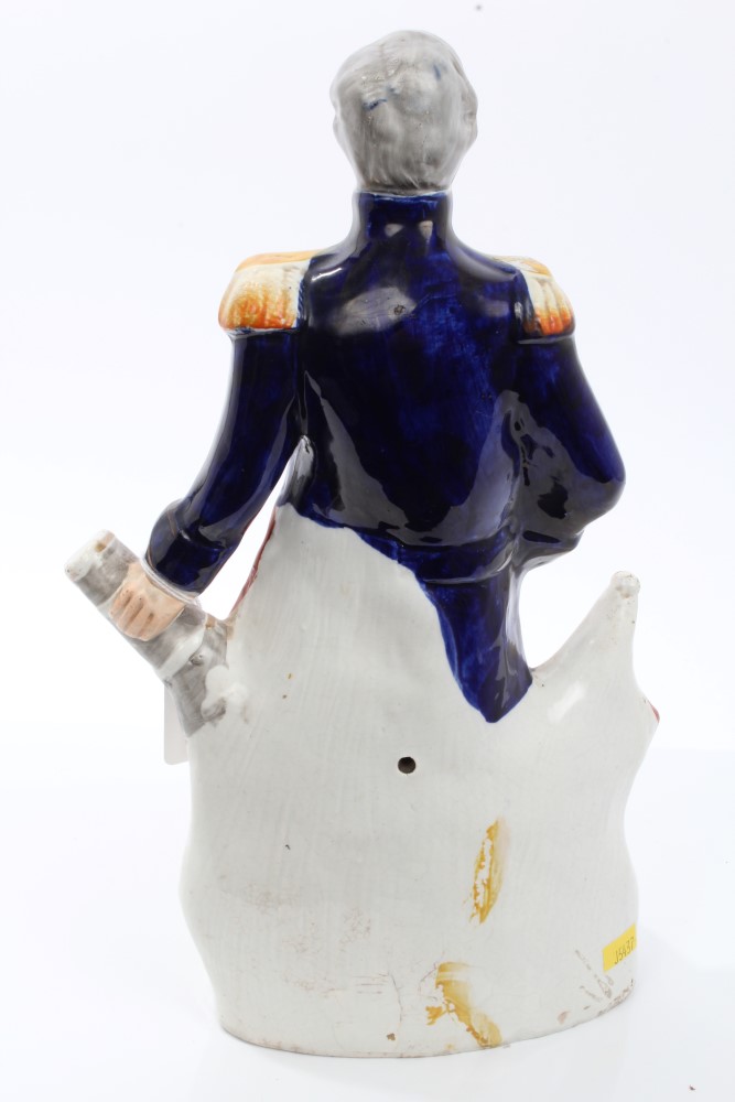 Victorian Staffordshire figure of Admiral Dundas in uniform, with cannon and flag supports, - Image 2 of 2