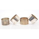 Set of three contemporary silver napkin rings of plain oval form (London 1971), maker - S. J. R.