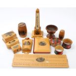 Collection of Mauchline ware - including crib board, obelisk-form thermometer boxes,