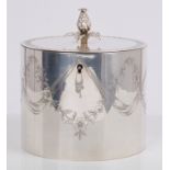 George III silver tea caddy of drum form, with lock and engraved garland and swag decoration,