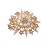 Victorian-style garnet and seed pearl starburst brooch in gold (9ct) setting,