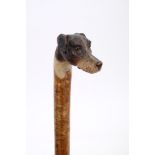 A fine Edwardian Dunhill carved and painted, realistically modelled hounds head stick,