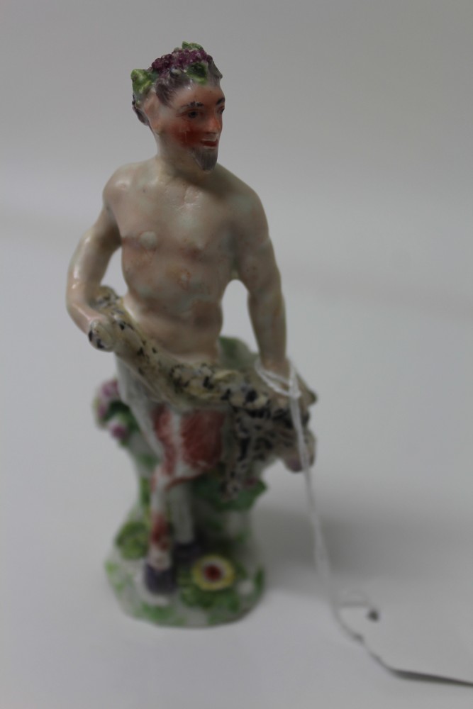 Early 19th century Continental porcelain figure of a semi-clad blacksmith with hammer and anvil, - Image 11 of 17