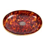 Early Edwardian tortoiseshell dish of oval form,