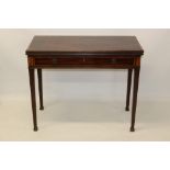 George III mahogany and kingwood crossbanded card table with rectangular fold-over top enclosing