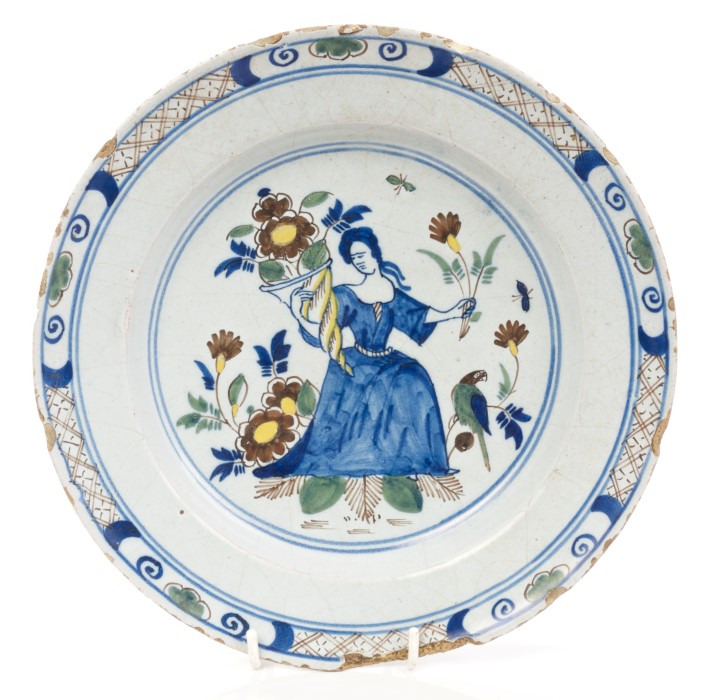 18th century English Delft blue and white allegorical subject plate painted in green,