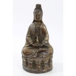 Chinese bronze figure of Guanyin seated on lotus flower base - character mark to base, 16.