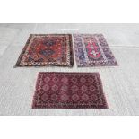 Turkish rug with three cruciform medallions within multiple geometric borders,