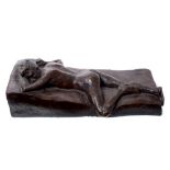 Penny Grant, bronzed plaster study of a naked youth lying on his front, signed, 49.