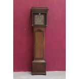 18th century longcase clock with eight day movement, 10 inch brass dial with face mask spandrels,