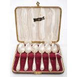 Set of six 1930s silver coffee spoons with part feather edge decoration,