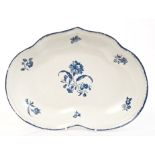 18th century Worcester blue and white kidney-shaped dish with printed floral spray decoration,