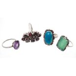 Four dress rings - to include faux alexandrite ring, garnet cluster ring,