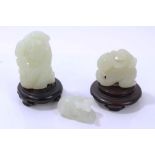 Three Chinese green jade carvings of figures, 4cm - 5.