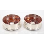 Pair contemporary silver wine coasters of plain circular form,