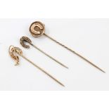Group of three Victorian stick pins of sporting interest - to include diamond set horseshoe and