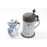 Early 19th century Continental faience stein with painted floral sprigs and pewter hinged cover,