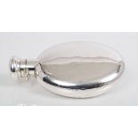 Late Victorian silver spirit flask of oval form, with hinged bayonet fitting cap (Birmingham 1897),