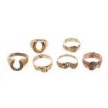 Two gold buckle rings, 'Fede' ring with clasped hands,