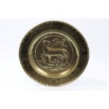 17th century Nuremberg brass alms dish with embossed roundel depicting the Lamb of God, 32.