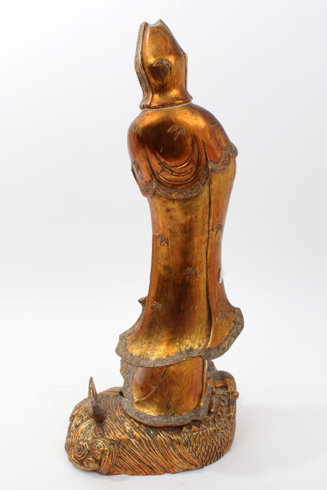 Large Chinese and giltwood figure of Guanyin in contemplative pose, holding a vessel, - Image 4 of 4