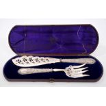 Fine quality pair Victorian silver fish servers with pierced foliate decorated blades and ornate