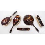 1920s five piece silver and tortoiseshell dressing table set - comprising two pairs brushes and a