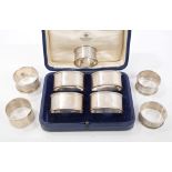 Set of four 1930s silver napkin rings with basket-weave engine-turned decoration,