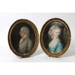 Pair late 18th century English School oval pastel portraits - a lady in blue dress and a gentleman