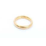 Yellow metal wedding ring, stamped - '22ct'.