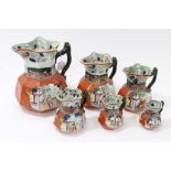 Set of six Victorian Masons Patent ironstone china graduated jugs with moulded branch handles,