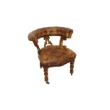 Good mid-19th century walnut and buttoned leather upholstered desk chair with upholstered bowed