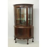 Good quality mahogany demi-lune display cabinet, with guilloche frieze,
