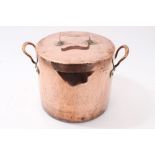 Substantial antique copper-lidded vessel of cylindrical form, with flanking twin handles, stamped L.