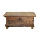 17th century Italian fruitwood coffer of small size, the solid lid hinging on pins,