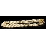 Cultured pearl triple-strand necklace with three strings of graduated cultured pearls measuring