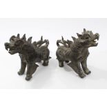 Pair of Eastern bronze figures of mythical beasts,