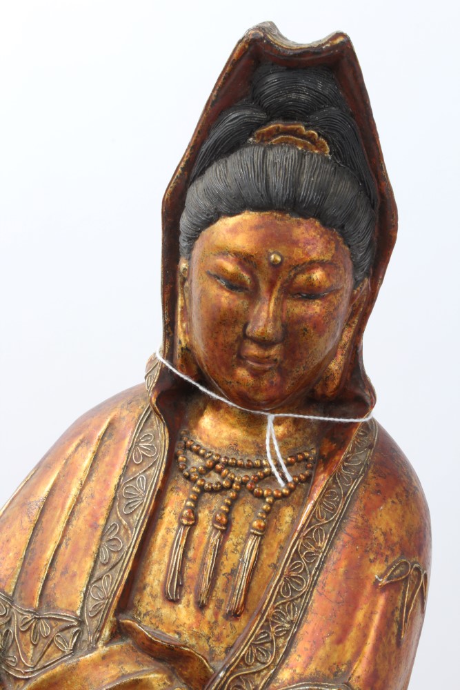Large Chinese and giltwood figure of Guanyin in contemplative pose, holding a vessel, - Image 3 of 4