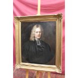 Early 18th century English School oil on canvas - portrait of a clergyman, within an oval,