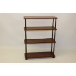 Set of early Victorian mahogany hanging shelves with four moulded shelves between slender turned