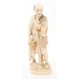 Japanese Meiji period carved ivory figure of a farmer,