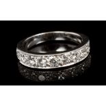Diamond nine stone eternity ring with nine brilliant cut diamonds estimated to weigh approximately