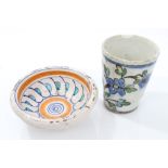 Antique Iznic pottery beaker with polychrome floral decoration, 11cm and a similar bowl,