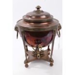Regency Egyptian style copper samovar of oval form, with lion's head bosses and ring handles,