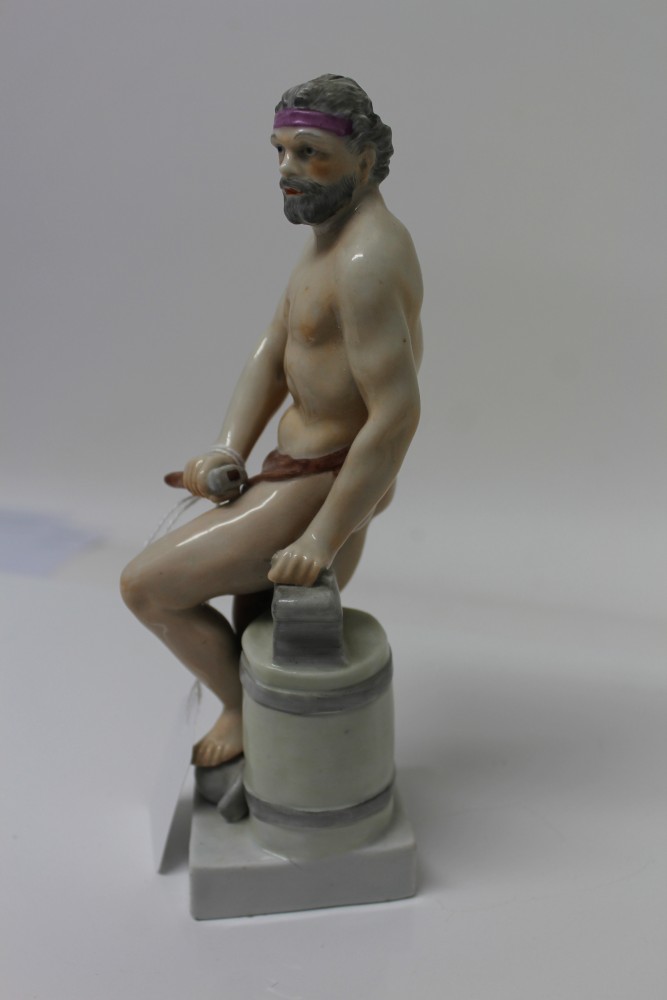 Early 19th century Continental porcelain figure of a semi-clad blacksmith with hammer and anvil, - Image 6 of 17